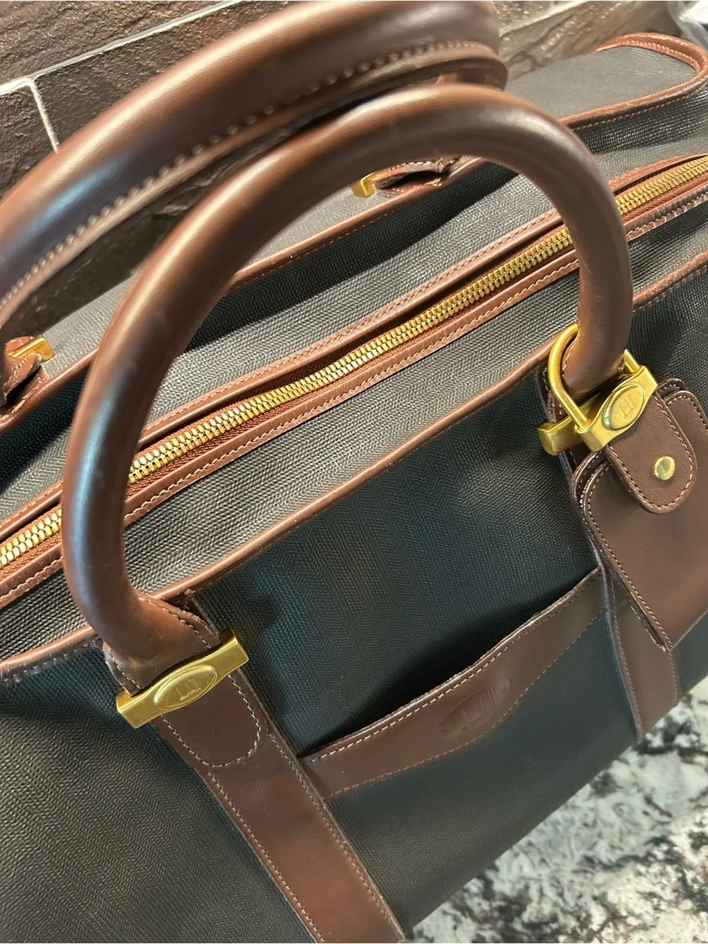 Dunhill Black Duffel with Brown Leather Trim and Gold Accents